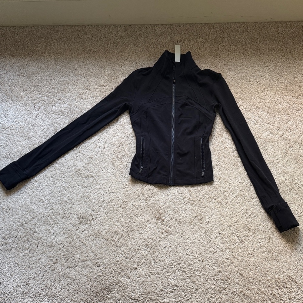 Lululemon black cropped define jacket-size 0 and barely worn.
